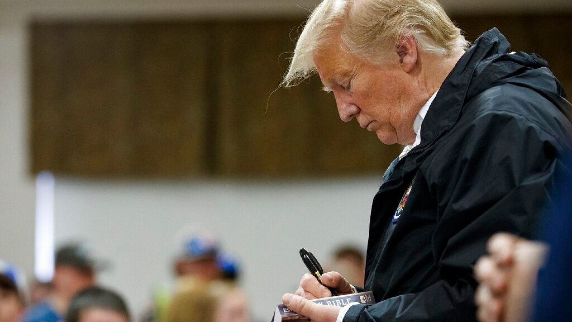 Was It OK for Trump to sign Bibles in Alabama visit? Religious leaders weigh in