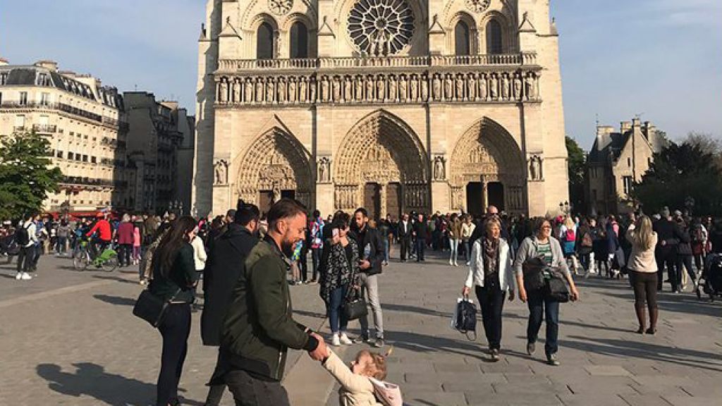 Tourist searching for people in ‘historic’ Notre Dame Cathedral photo taken one hour before fire