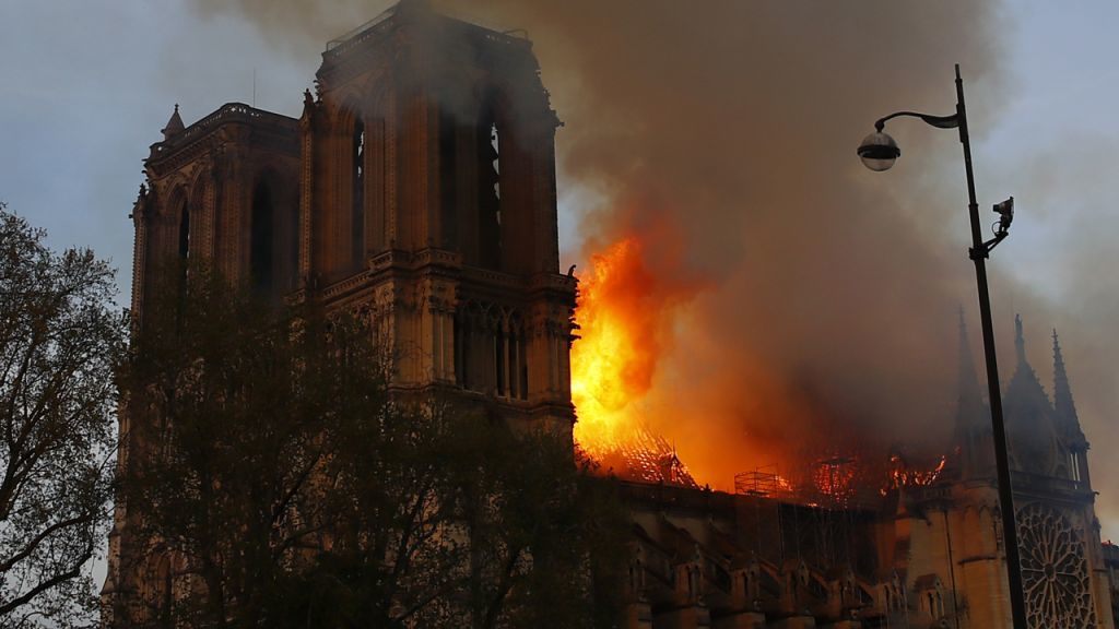 Notre Dame fire: YouTube slammed after live footage appears with link to 9/11 info