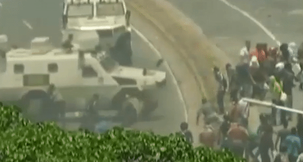 Venezuela uprising turns violent after military armored vehicle plows into crowd of opposition supporters