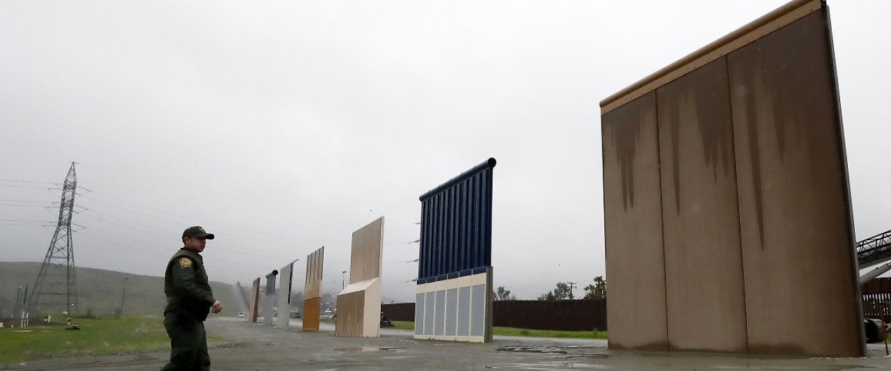 Judge temporarily blocks Trump border wall construction plans