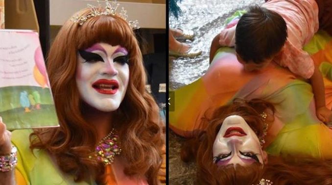 Disturbing Photos: Kids Lie on Man Dressed as Woman at Drag Queen Story Time