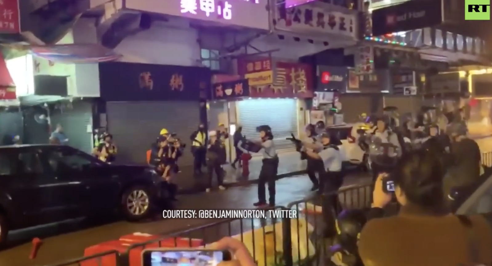 Hong Kong protestors go after police forcing them to draw guns!