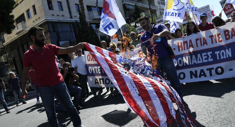 ‘Pompeo Go Home’: Protesters Burn US Flag in Greece Amid Secretary of State’s Visit (Photo, Video)