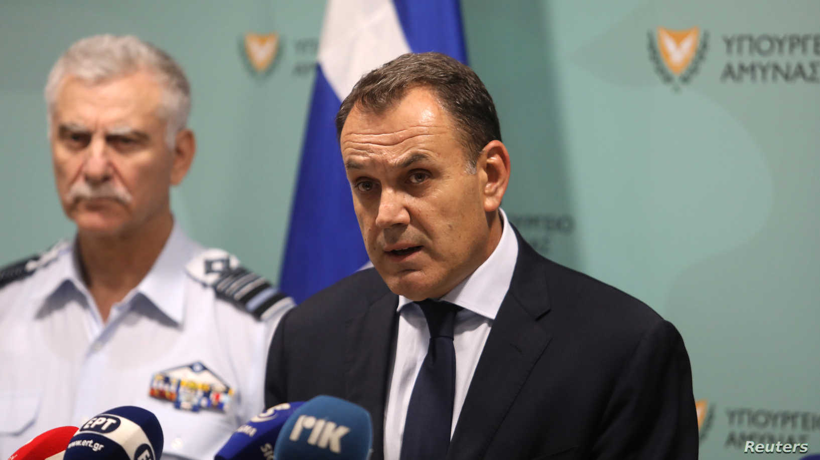 Greek Defence Minister Nikos Panagiotopoulos speaks during a press conferen...