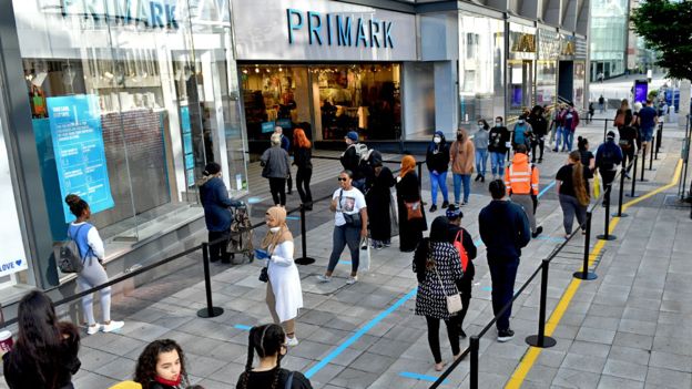Long queues as shops reopen in England after lockdown
