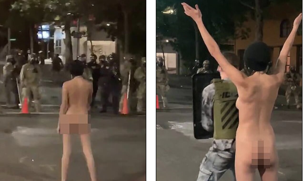 Protester dubbed ‘Naked Athena’ strips off and dares police to shoot her with tear gas during tense stand-off in the 50-day ‘Battle of Portland’