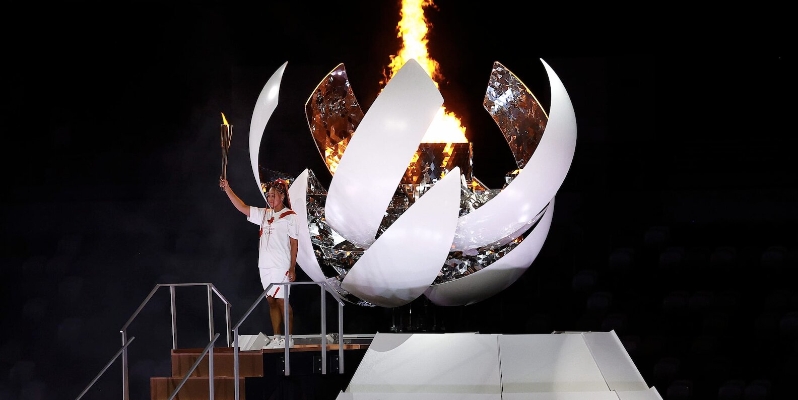 Tennis star Osaka lights Olympic flame as Games begin